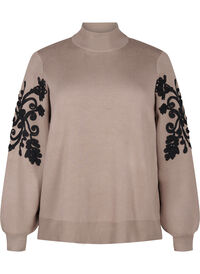 Knitted blouse with embroidery