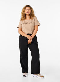 Flared trousers with pockets, Black, Model