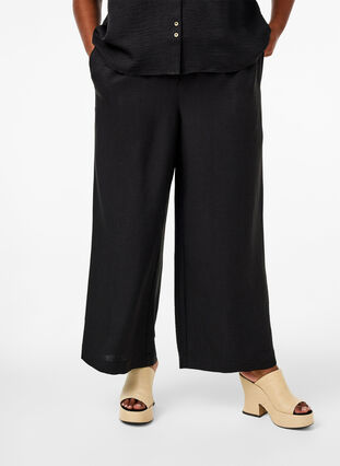 Zizzifashion Loose trousers with elasticated waistband and pockets, Black, Model image number 2