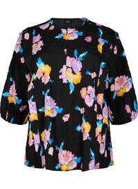 Floral blouse with round neck and zip