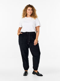 Corduroy trousers with an elastic waistband, Black, Model