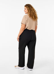 Flared trousers with pockets, Black, Model